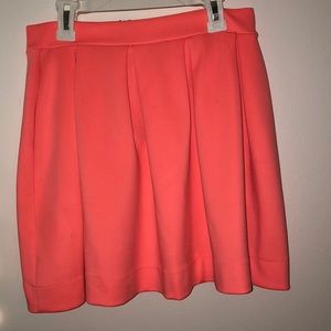 Vibrant coral skirt with zipper in back